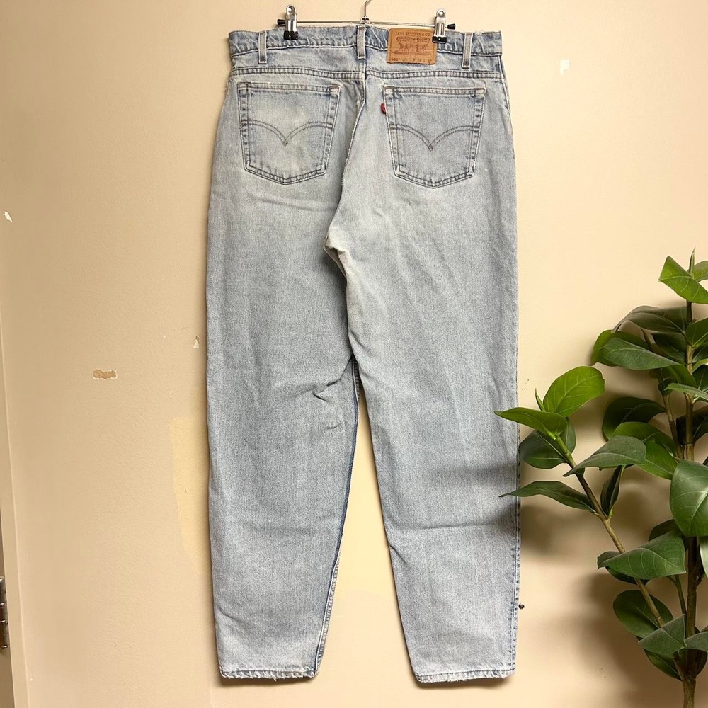 Vintage Levis 560 Mens 36x34 Light Wash Blue Loose Fit Tapered Leg Jeans USA